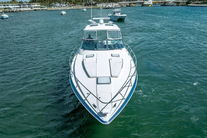 Slide: The Image of 2022 Formula 40 Performance Cruiser on open water, showcasing sleek design and luxury. - 12