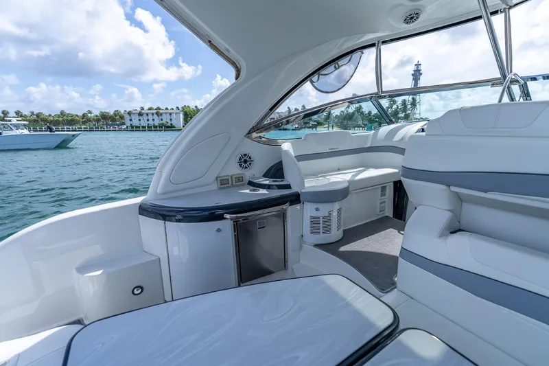 Slide: The Image of 2022 Formula 40 Performance Cruiser interior with luxurious seating and scenic water view. - 23
