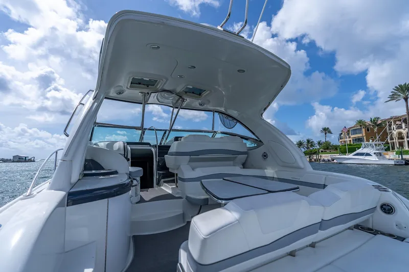 Slide: The Image of 2022 Formula 40 Performance Cruiser interior with seating, under a blue sky. - 24