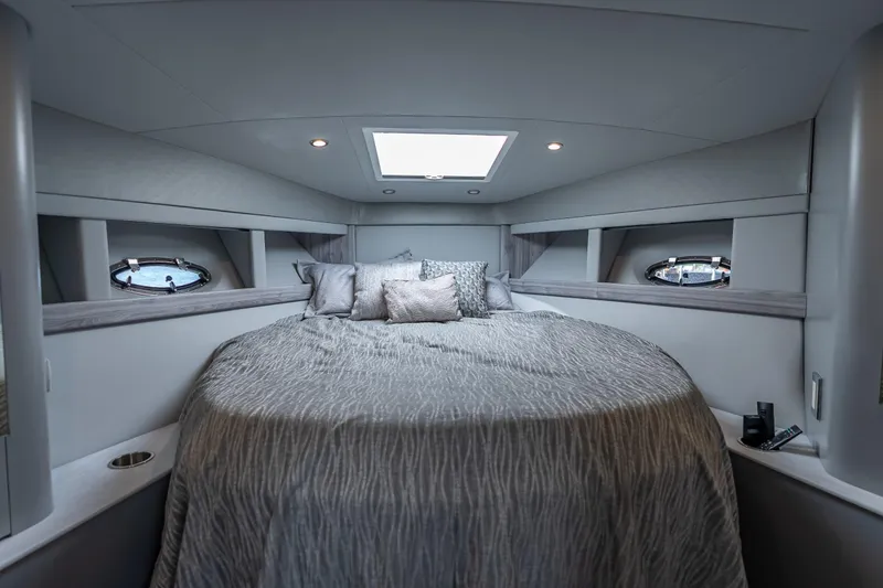 Slide: The Image of Luxurious interior of 2022 Formula 40 Performance Cruiser with elegant bedding and modern design. - 34