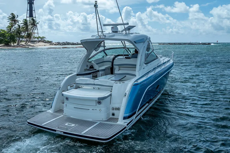 Slide: The Image of 2022 Formula 40 Performance Cruiser on ocean near tropical island and lighthouse. - 6