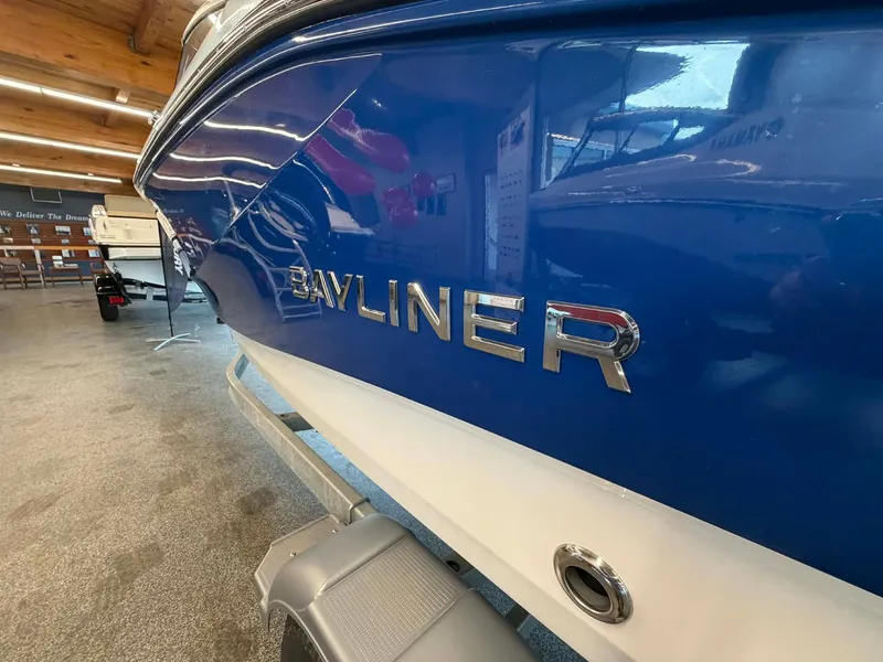 Slide: The Image of 2026 Bayliner V20 boat in a showroom. - 3