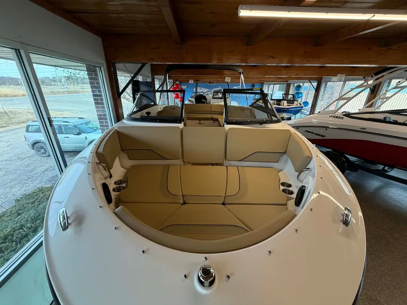 Slide: The Image of Interior view of Bayliner V20 boat, 2026 model, in a showroom. - 4