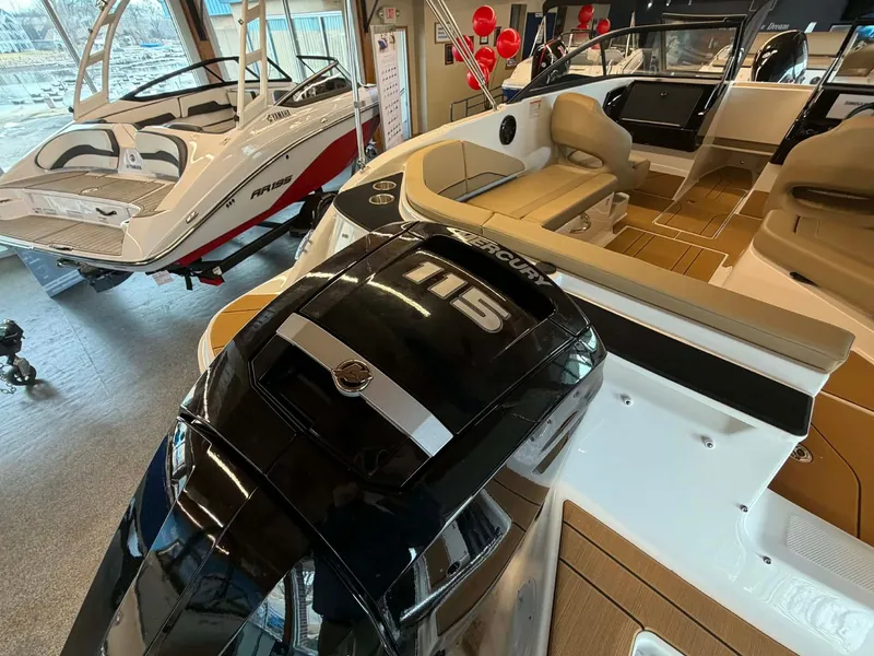 Slide: The Image of Bayliner V20 2026 with Mercury 115 engine in showroom. - 5
