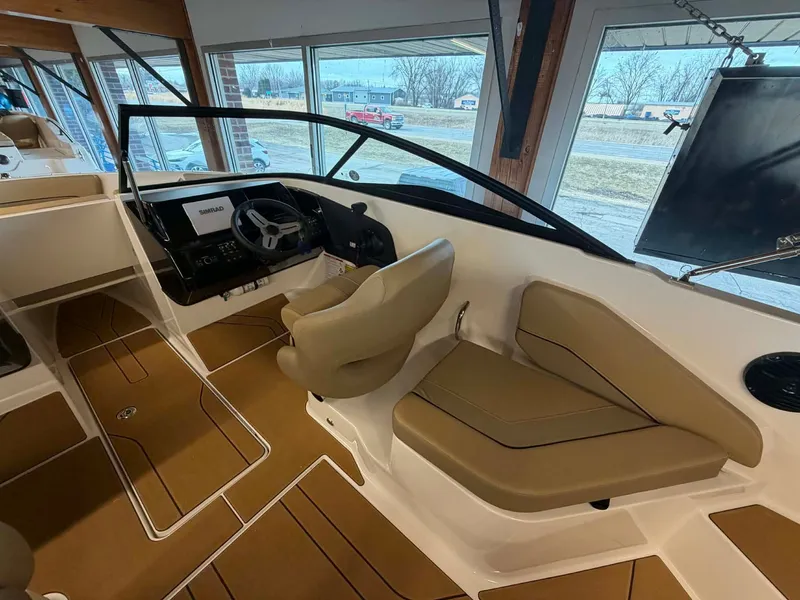 Slide: The Image of Interior of 2026 Bayliner V20 with modern helm console. - 7