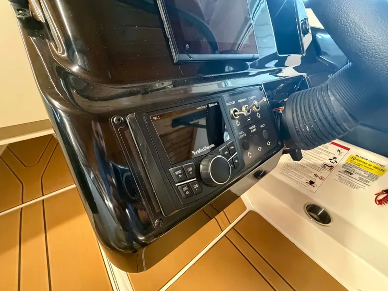 Slide: The Image of Bayliner V20 2026 dashboard with controls and display. - 9