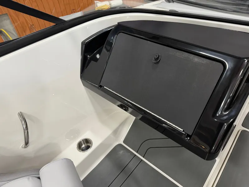 Slide: The Image of Interior of 2026 Bayliner V20 featuring black dashboard. - 11