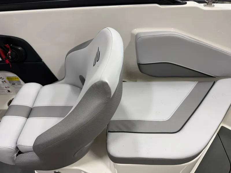 Slide: The Image of Interior of Bayliner V20 2026 with gray seating. - 18