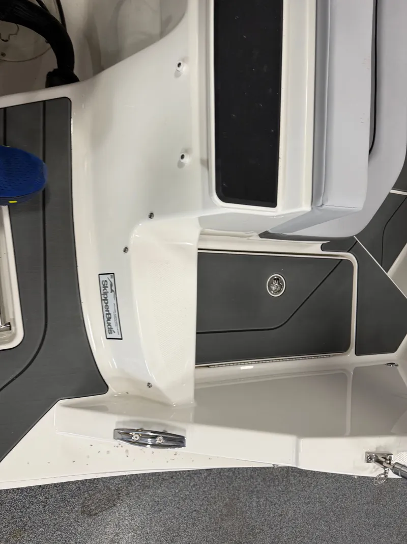 Slide: The Image of Interior of a 2026 Bayliner V20 boat with gray accents. - 5