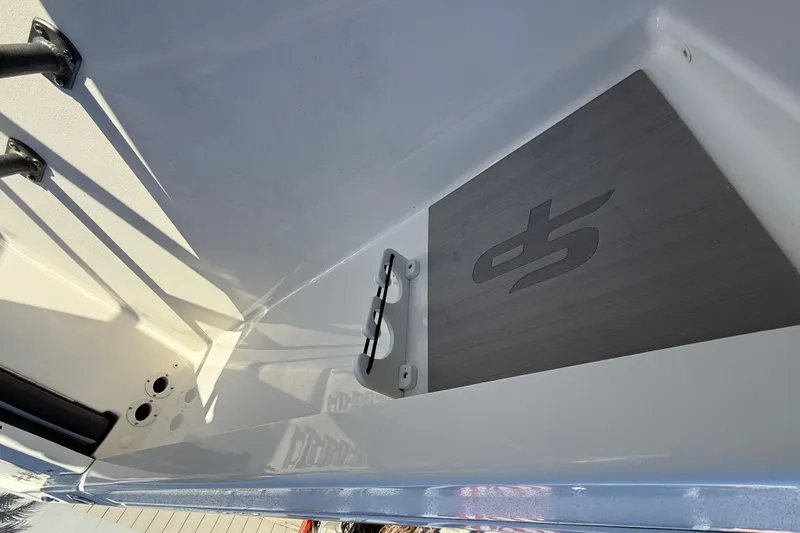Slide: The Image of 2025 Sea Pro 230 Bay boat interior detail with logo and fittings. - 18