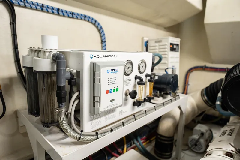 Slide: The Image of Engine room of 1998 Hatteras 74 Cockpit Motor Yacht with Aquamiser+ water system. - 56