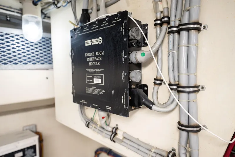 Slide: The Image of Engine room interface module in 1998 Hatteras 74 Cockpit Motor Yacht. - 57