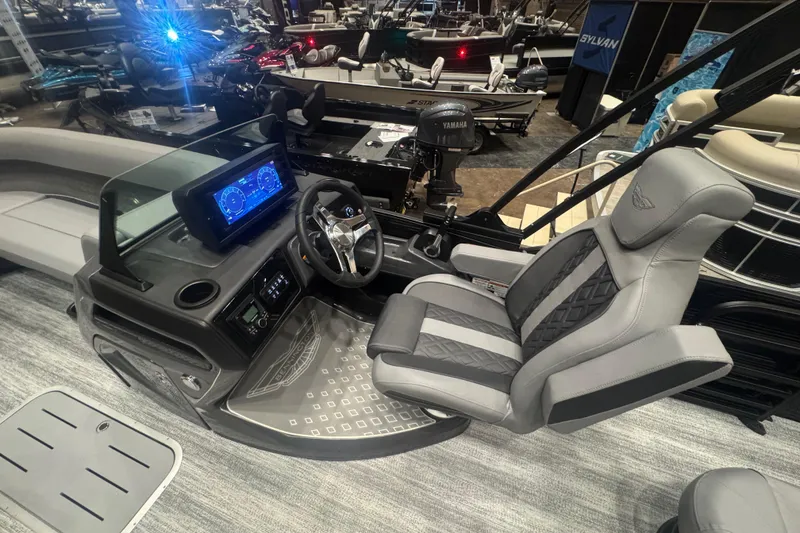 Slide: The Image of 2026 Bennington 24 M Swingback boat interior with modern dashboard and luxurious seating. - 10