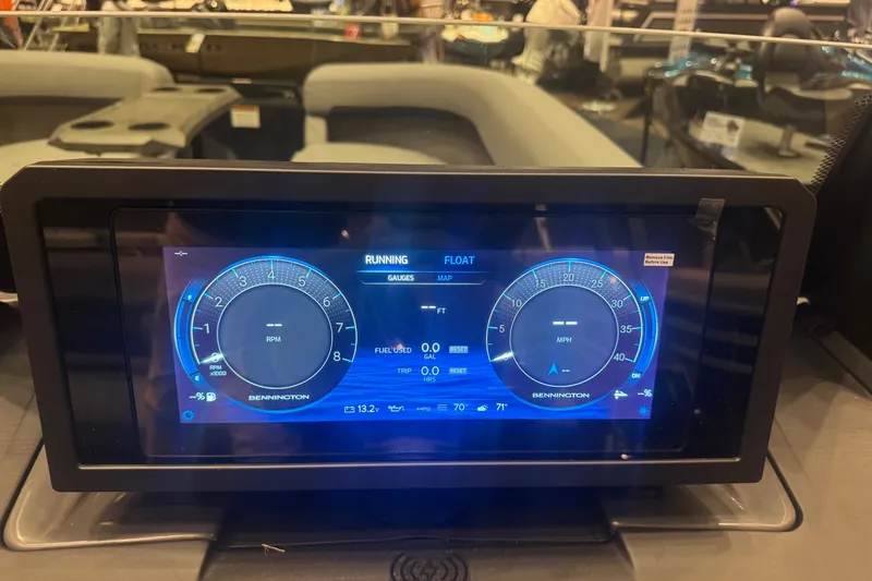 Slide: The Image of Digital dashboard of 2026 Bennington 24 M Swingback boat, displaying RPM and speed gauges. - 14