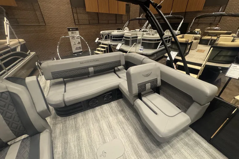 Slide: The Image of 2026 Bennington 24 M Swingback pontoon boat interior with luxurious seating and modern design. - 15