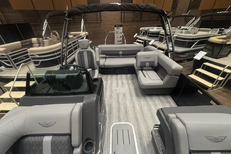 Slide: The Image of 2026 Bennington 24 M Swingback pontoon boat interior with luxurious seating and modern design. - 9