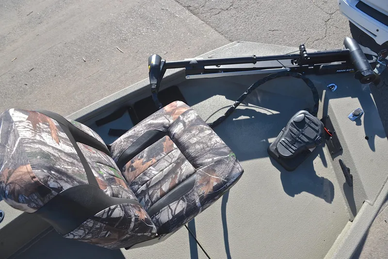 Slide: The Image of Camouflage seat and trolling motor on 2013 Express Xp170 boat deck. - 25