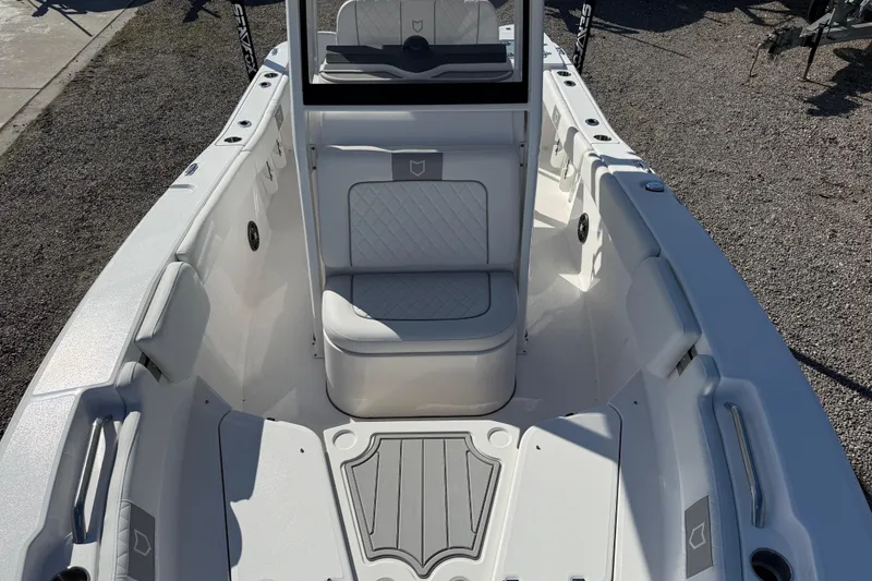 Slide: The Image of 2025 Sea Fox 228 Commander boat interior with cushioned seating and sleek design. - 16