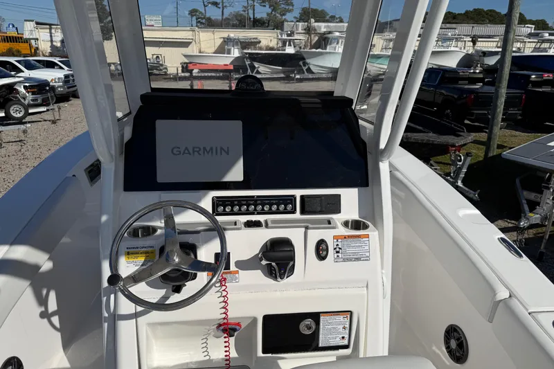 Slide: The Image of 2025 Sea Fox 228 Commander boat dashboard with Garmin navigation system. - 27