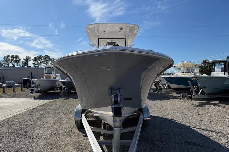 Slide: The Image of 2025 Sea Fox 228 Commander boat on trailer under clear blue sky. - 3