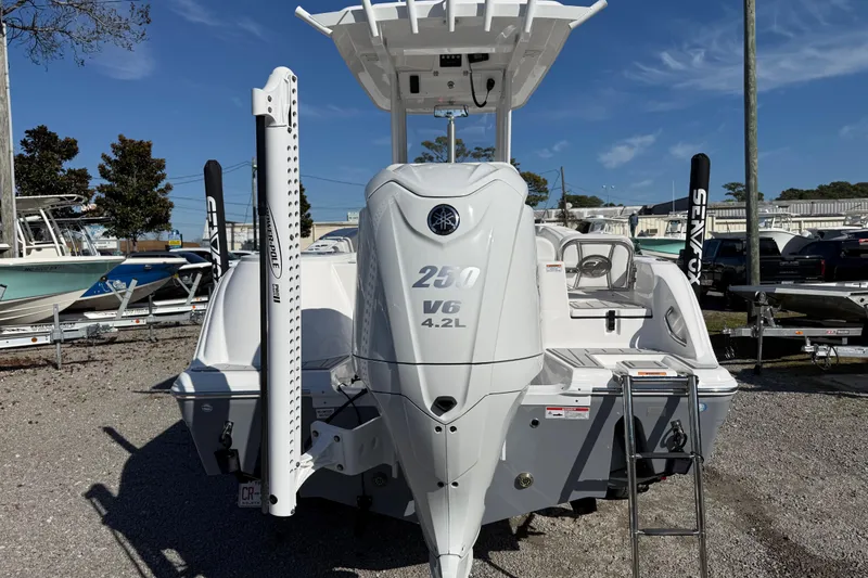 Slide: The Image of 2025 Sea Fox 228 Commander boat with Yamaha 250 V6 engine, displayed outdoors. - 9