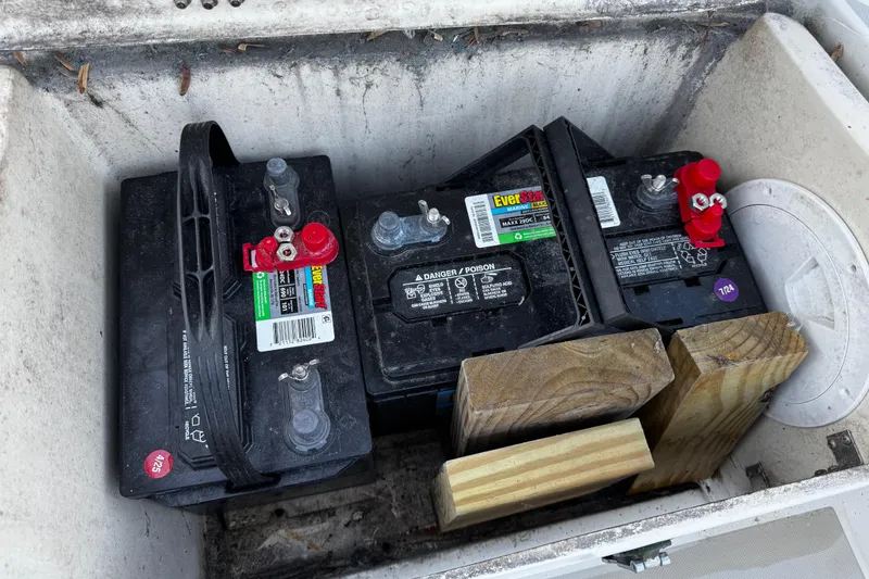 Slide: The Image of Marine batteries in an O'Day 222 sailboat, secured with wooden blocks, 1984 model. - 30