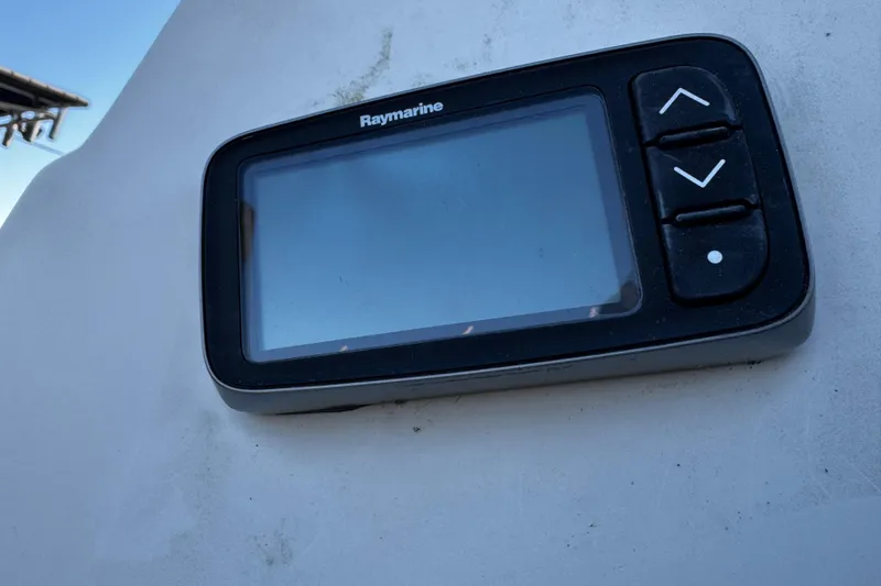 Slide: The Image of Raymarine display on 1984 O'Day 222 sailboat, featuring navigation controls. - 35