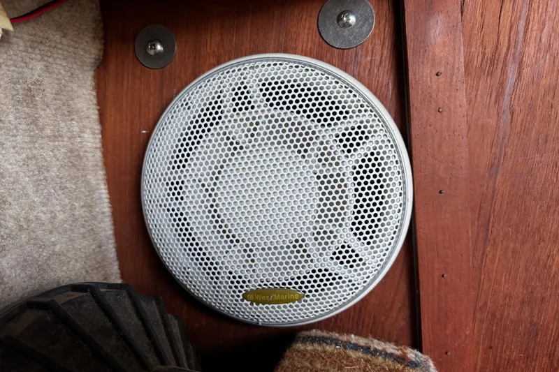 Slide: The Image of Speaker mounted on wooden panel inside 1984 O'Day 222 sailboat cabin. - 55