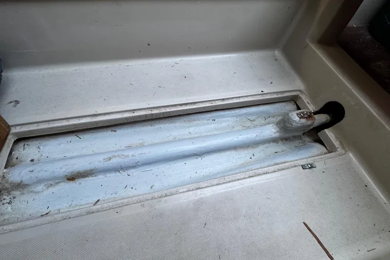 Slide: The Image of 1984 O'Day 222 sailboat interior detail showing keel trunk area. - 58