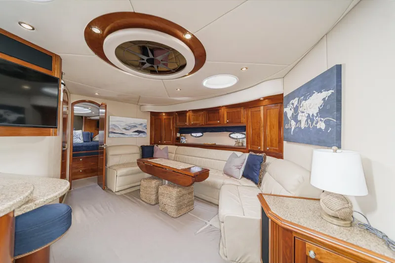Slide: The Image of Luxurious interior of 2004 Cruisers Yachts 540 Express with elegant seating and decor. - 38
