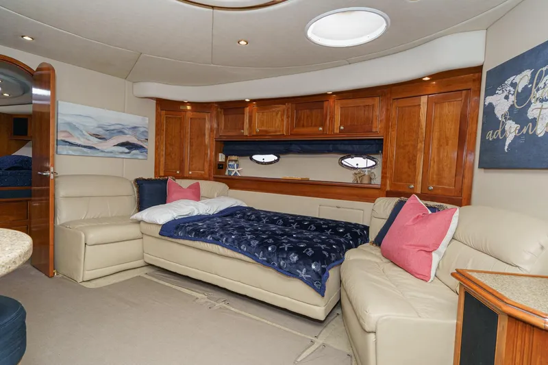 Slide: The Image of Luxurious interior of 2004 Cruisers Yachts 540 Express with elegant seating and decor. - 46