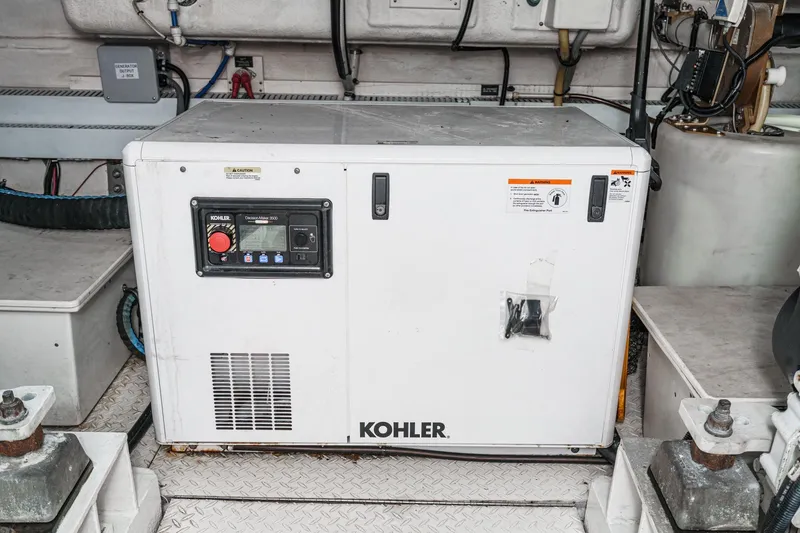 Slide: The Image of Kohler generator in 2004 Cruisers Yachts 540 Express engine room. - 64