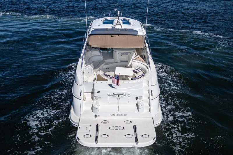 Slide: The Image of 2004 Cruisers Yachts 540 Express on open water, rear view, San Diego, CA. - 9