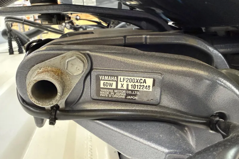 Slide: The Image of Close-up of Yamaha LF200XCA engine part on 2022 Parker 2501 Center Console boat. - 21