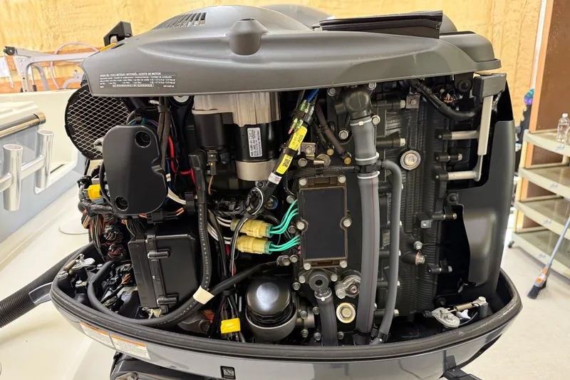 Slide: The Image of 2022 Parker 2501 Center Console boat engine, detailed view of internal components. - 25