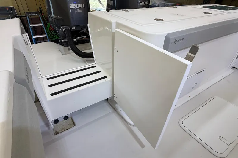 Slide: The Image of 2022 Parker 2501 Center Console boat with Yamaha 200 engine, interior view. - 35