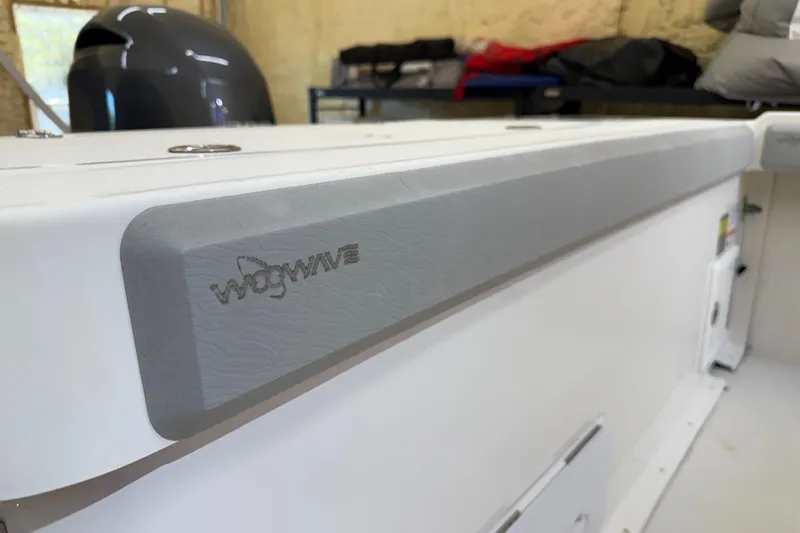 Slide: The Image of 2022 Parker 2501 Center Console boat with gray WogWave padding detail. - 36