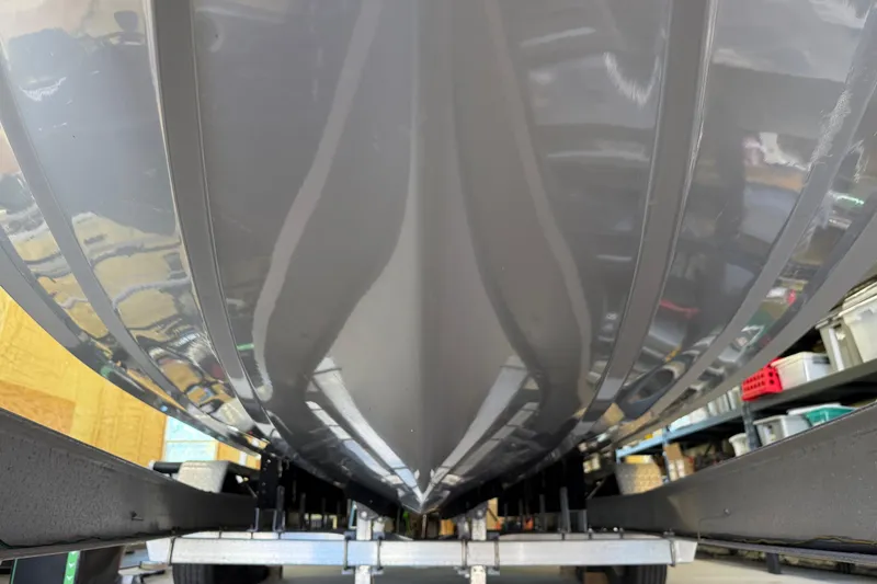 Slide: The Image of Close-up of 2022 Parker 2501 Center Console boat hull on trailer. - 5