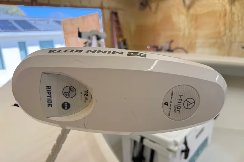 Slide: The Image of Minn Kota Riptide motor on 2022 Parker 2501 Center Console boat. - 79