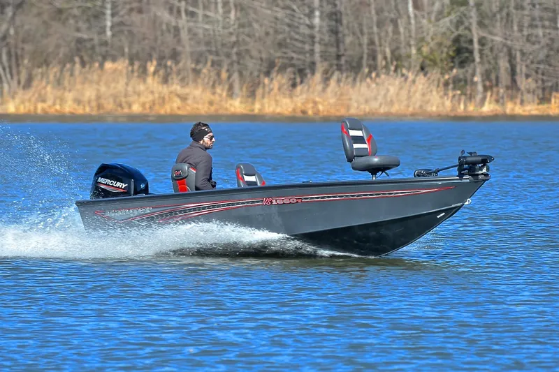 The Image of 2021 Ranger VS1660 T boat speeding on a lake with Mercury engine. - 1