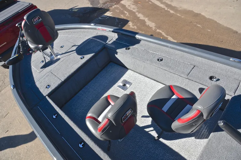 Slide: The Image of 2021 Ranger VS1660 T boat interior with two cushioned seats and carpeted deck. - 20