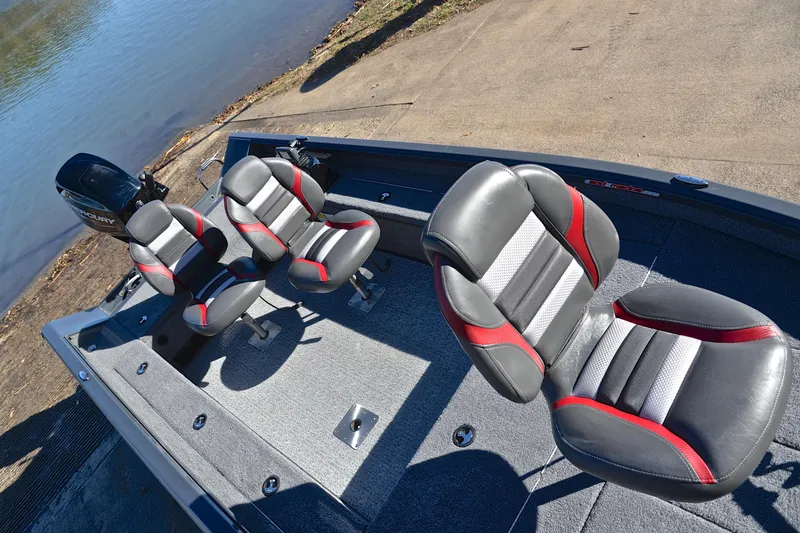 Slide: The Image of 2021 Ranger VS1660 T boat with stylish seating and Mercury outboard motor by the water. - 23