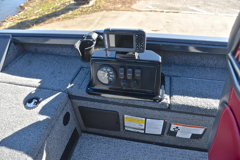 Slide: The Image of 2021 Ranger VS1660 T boat dashboard with Lowrance device and control panel. - 24