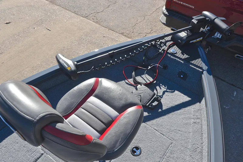 Slide: The Image of 2021 Ranger VS1660 T boat with Minn Kota trolling motor and cushioned seat. - 25
