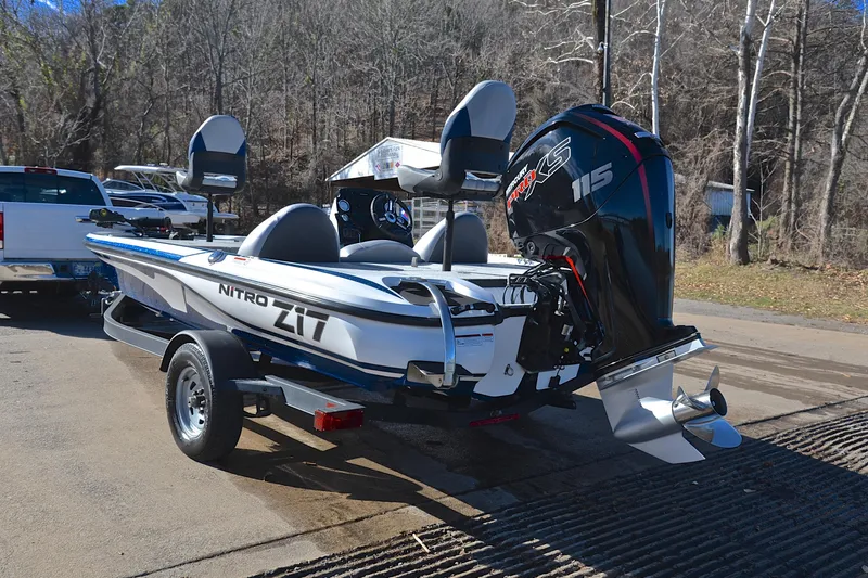 Slide: The Image of 2018 Nitro Z17 boat with powerful outboard motor on trailer. - 12