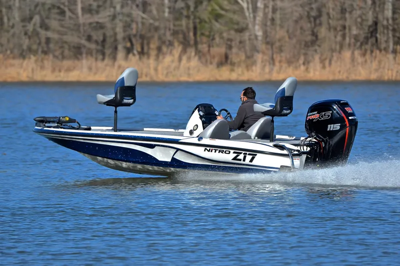 Slide: The Image of 2018 Nitro Z17 boat speeding on a lake with a powerful outboard motor. - 4