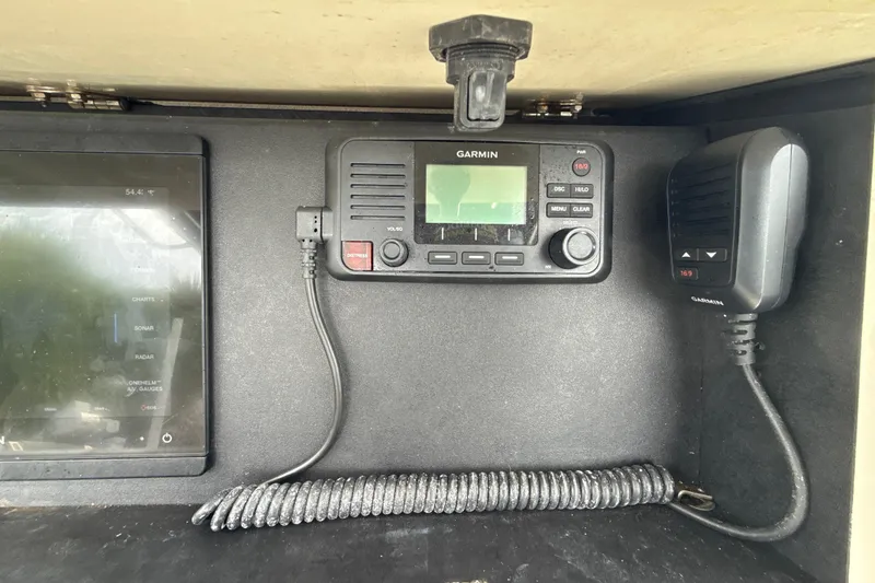 Slide: The Image of 2003 Hydra-Sports Vector 2800 CC dashboard with Garmin marine radio and display. - 8