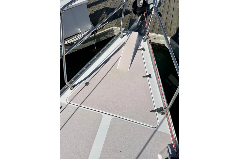 Slide: The Image of Deck of 1996 Catalina 400 sailboat with stainless steel railings at dock. - 17