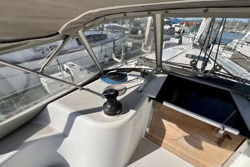 Slide: The Image of Cockpit view of a 1996 Catalina 400 sailboat in a marina. - 35