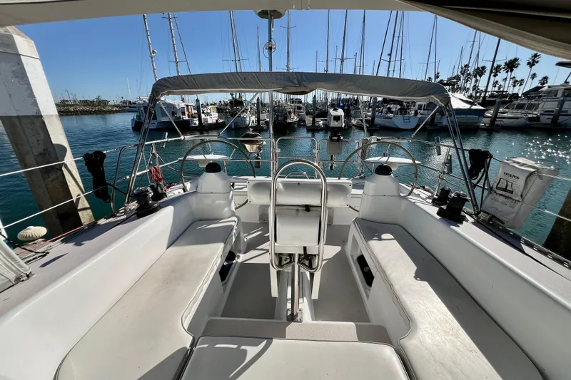 Slide: The Image of Cockpit view of a 1996 Catalina 400 sailboat docked in a marina. - 39